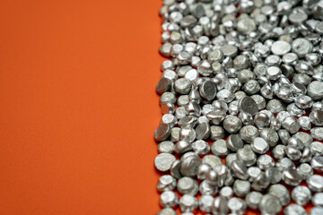 Aluminum tart stones in glass jar
