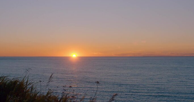 Sunset at the river with clear sky / Time lapse / Matane