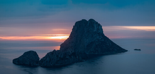 Es Vedra Rock at Sunset in Ibiza with Calm Sea and Sky