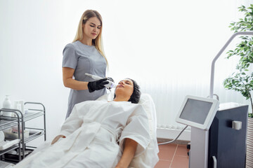 Microneedle RF lifting procedure. Hardware cosmetology.