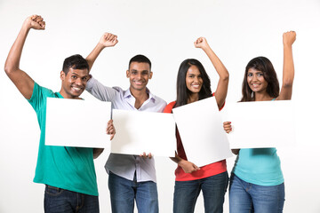 Group of Indian people with a banner ad.