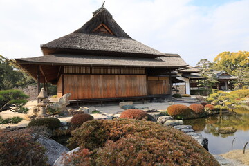 Japanese sentiments : the scene of a Japanese traditional thatched house in Koraku-en Japanese...