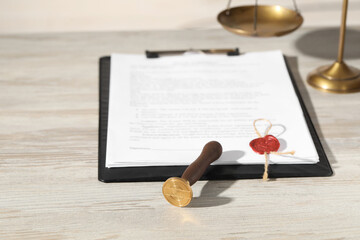 Notary contract. Sealed document and wax stamp on wooden table