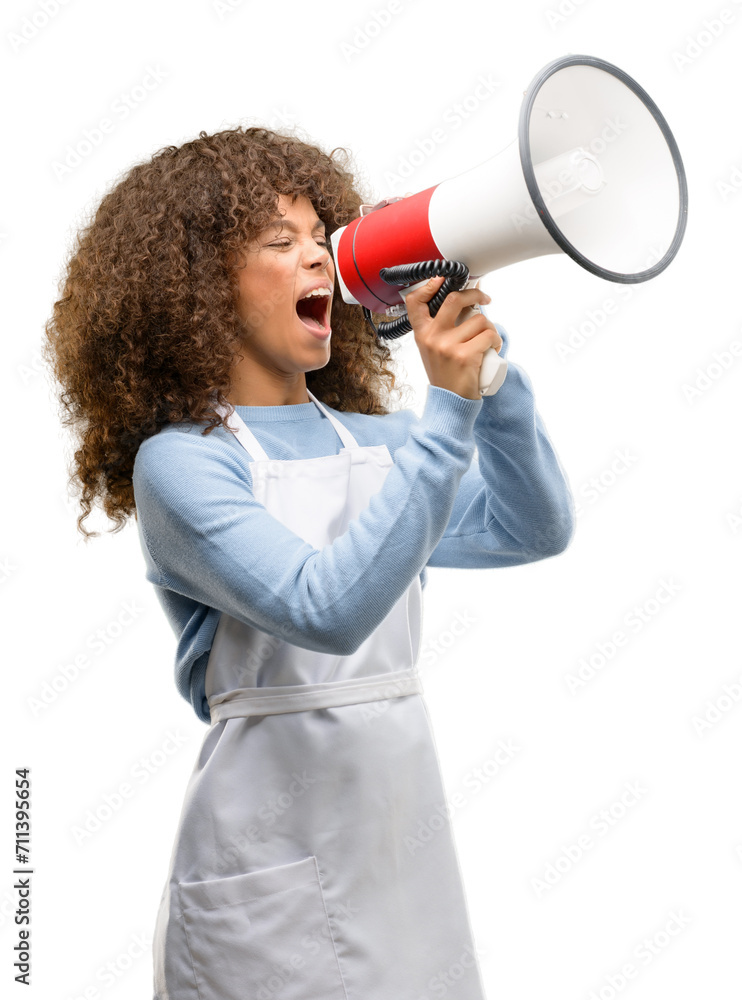 Sticker African american shop owner woman wearing an apron communicates shouting loud holding a megaphone, expressing success and positive concept, idea for marketing or sales