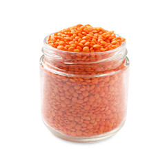 Raw lentils in glass jar isolated on white