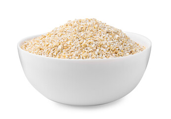 Raw barley groats in bowl isolated on white