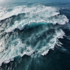 A breathtaking aerial top-view background photograph capturing the spectacle of ocean waves, their white crests splashing in the deep sea