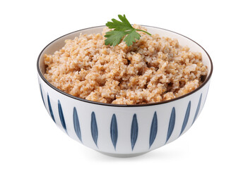 Tasty wheat porridge with parsley in bowl isolated on white