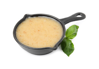 Delicious turkey gravy and basil isolated on white