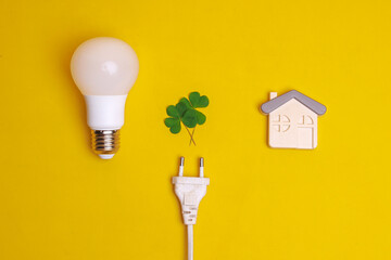Light bulb, leaf, electric plug and a house symbol. Concept for saving energy, eco friendly and...