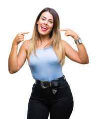 Young beautiful elegant business woman over isolated background smiling confident showing and pointing with fingers teeth and mouth. Health concept.