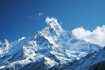 Fototapeta na wymiar Capture the grandeur of snow-capped peaks against a clear blue sky