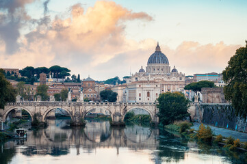 Beautiful colorful morning view of Rome Skyline with the famous Vatican Saint Peter Basilica and...