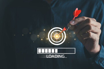 Businessman with goal or target dartboard and loading bar for goal setting in business and strategic plainning achievement concept. - obrazy, fototapety, plakaty