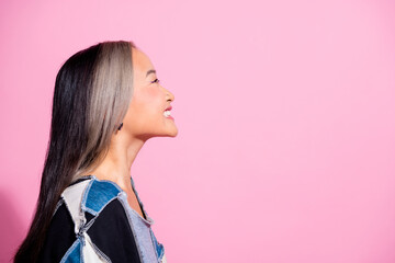 Profile photo of cheerful excited person beaming smile look empty space ad isolated on pink color background