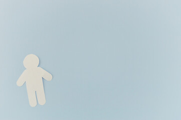 man from white paper on blue background. World Day of Peace. Day Against Humiliation. International...