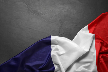 Flag of France on black background, top view. Space for text