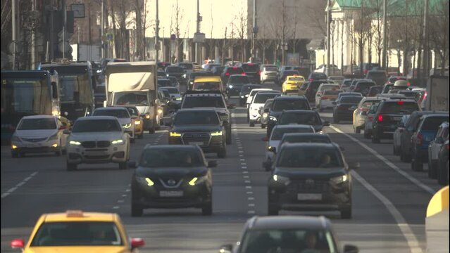  Dense traffic during rush hour on the central street of Moscow. Reportage shot of the city