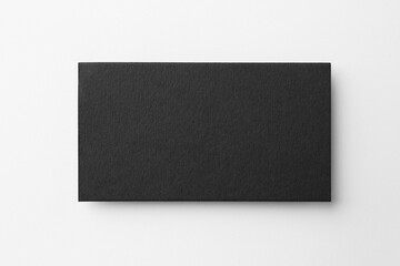 Blank black business card on white background, top view. Mockup for design