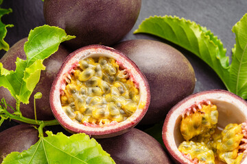Ripe passion fruits with passion fruit seeds .