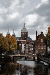 Tuinposter Amsterdam canals with autumn colours and old buildings cloudy day_2 © ILIAS