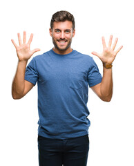 Fototapeta premium Young handsome man over isolated background showing and pointing up with fingers number ten while smiling confident and happy.