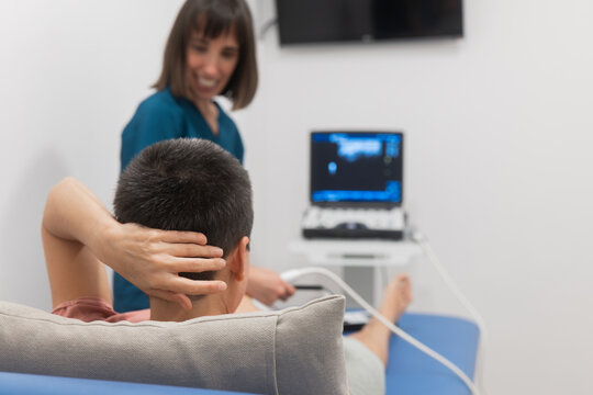 Patient receiving an ultrasound therapy at a clinic