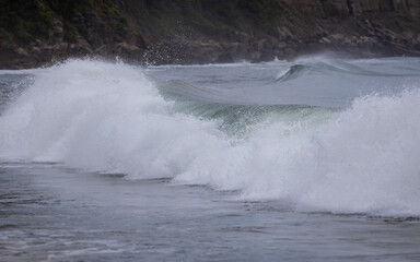 White water from breaking wave.