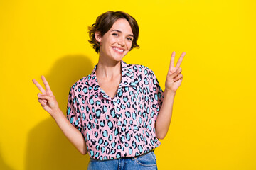 Photo of pretty lovely lady make v sign gesture smiling toothy isolated bright color background