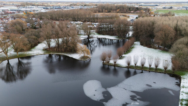 winter landscape with snow in netherlands made by a drone