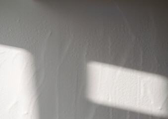 白い壁に影の背景