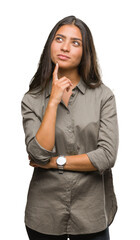 Young beautiful arab woman over isolated background with hand on chin thinking about question,...