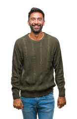 Adult hispanic man wearing winter sweater over isolated background with a happy and cool smile on...