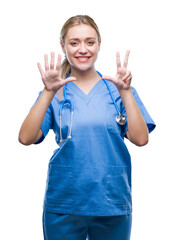 Young blonde surgeon doctor woman over isolated background showing and pointing up with fingers number eight while smiling confident and happy.