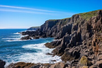 Rocky cliffs by the sea, with waves crashing below and a cloudless blue sky above, Generative AI