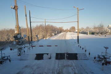 Railroad crossing in the winter