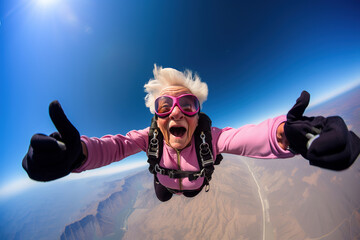Cheerful old granny trying skydiving in the sky and showing thumbs up. - obrazy, fototapety, plakaty