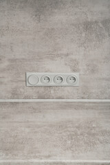 European electrical socket with light switch.