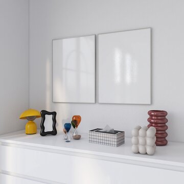two frames mockup on white wall with white console table. 2 empty posters, colorful decoration accessories. 3D illustration