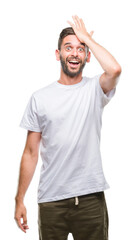 Young handsome man over isolated background surprised with hand on head for mistake, remember...