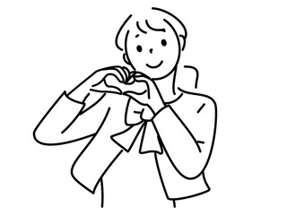 ハンドサインでハートをつくる笑顔の女性