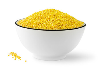 Bowl of raw yellow millet grains, isolated on white background
