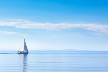Obraz premium A sailboat gliding on calm waters, the sail reflecting the pure blue of the sky, Generative AI