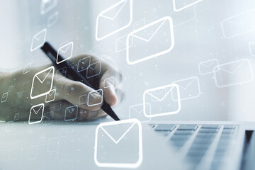Double exposure of postal envelopes hologram with hand writing in notebook on background with...