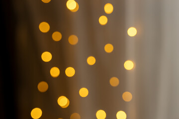 Gold abstract bokeh background for sparkle design, party time with Yellow bokeh balls