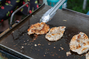 grilled chicken breast on the grill
