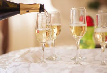 Wedding catering. Celebration marriage concept. Restaurant and bar alcohol menu. Luxury drink. Banquet service outdoor. Waiter brings glasses of champagne.