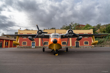 Vintage turboprop airplane in exhibition on the track of Italian Airforce Museum