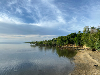 Long span of broad gently sloping strip of fine sand beach lures resort developers to put up structures – Catanauan, Quezon, Philippines