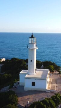 Aerial drone view of the Lighthouse or Cabo Ducato Lefkas in the southern area of the island of Lefkada. Greece.